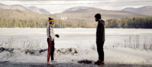 Fanny (Aya Cash) and Fred (Josh Ruben) meet by an icy lake.