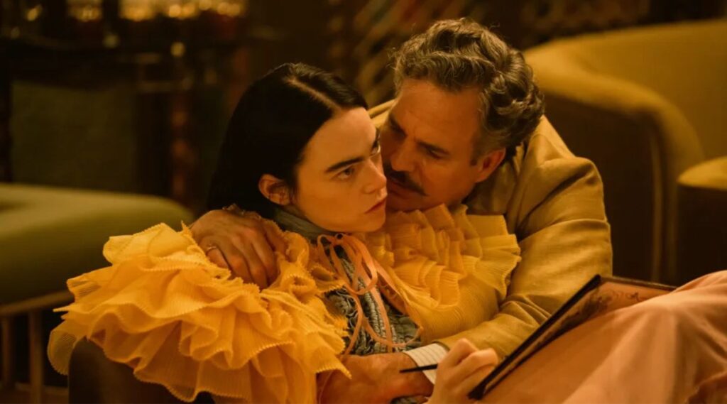 Emma Stone as Bella Baxter and Mark Ruffalo as Duncan Weatherburn in Poor Things