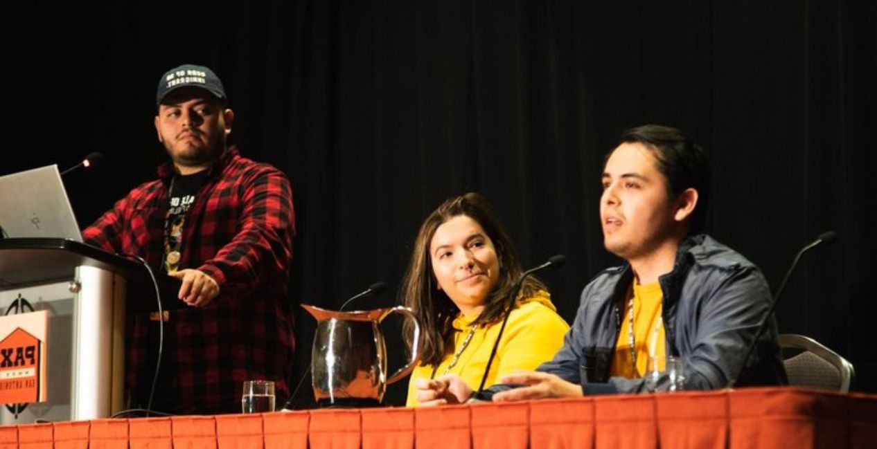 Members of Latinx in Gaming speak during a panel