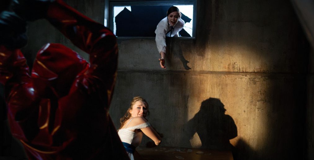 A masked killer chases potential victims in Fear Street Prom Queen