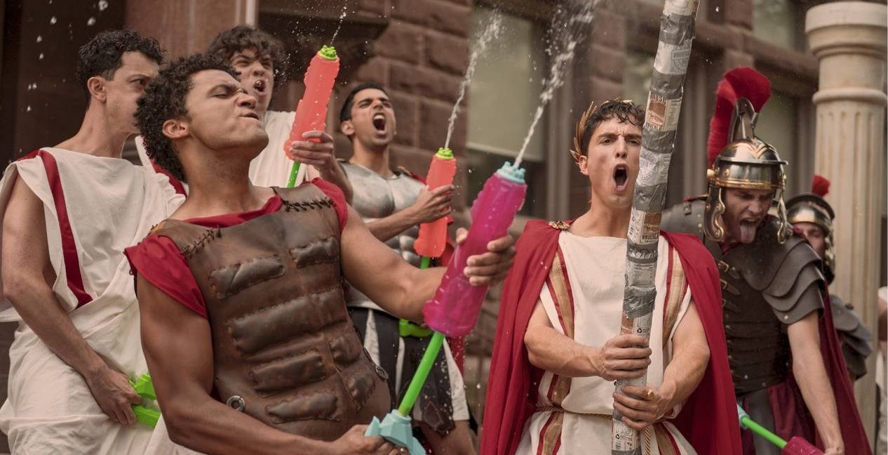 The fraternity Ceasar Celebration in Overcompensating (2025) Prime Video TV Show promotional image