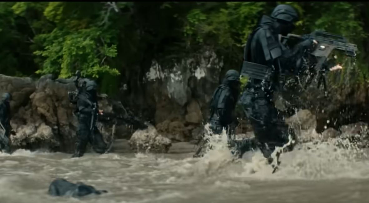 The soldiers run through the water in Alien Earth Episode 7