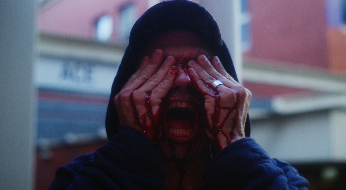 BHFF 2025: 'The Serpent's Skin' Is Experimental And Unapologetically Queer 2 A random mugger being attacked psychically, in the film The Serpent's Skin